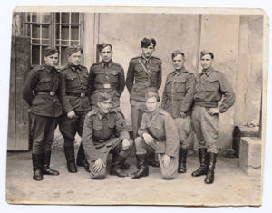 Po propuštění z pracovního tábora vstoupil do Československé armády (na snímku v zadní řadě třetí zleva).